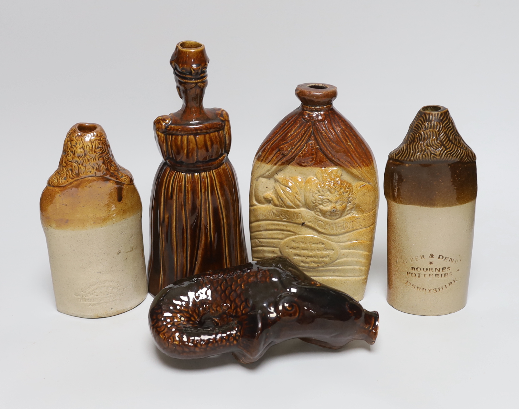A collection of five salt glazed stoneware gin flasks, including:- 'Lord Brougham - The True Spirit of Reform', reproduction 'The Second Magna Carta - Brougham Reform Cordial' 'Mr & Mrs Caudle', two other flasks and a De